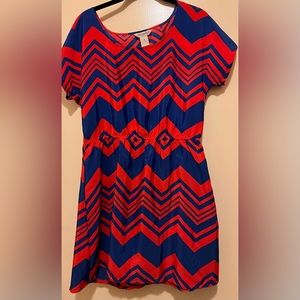 Women’s Fun & Flirt Slip On Mini w Elastic Waist Sz Medium. Bright Red and Blue.